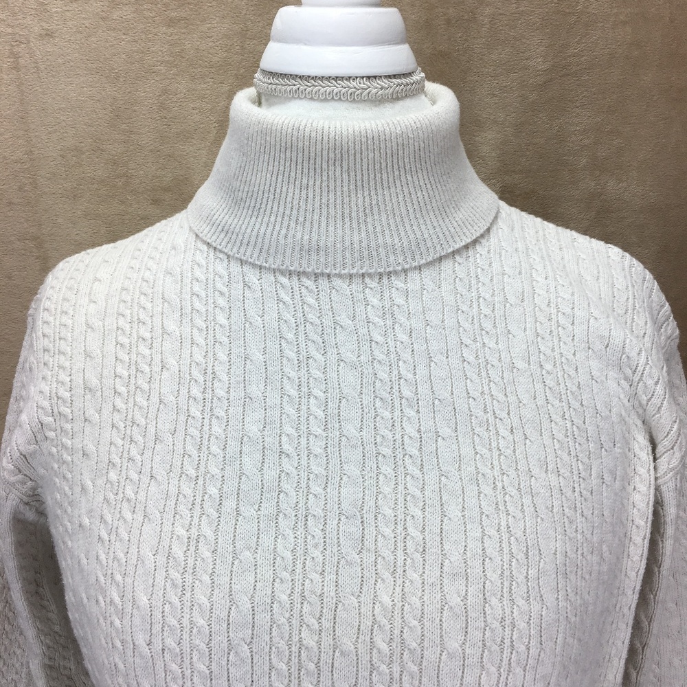 Beige cable knit turtleneck sweater